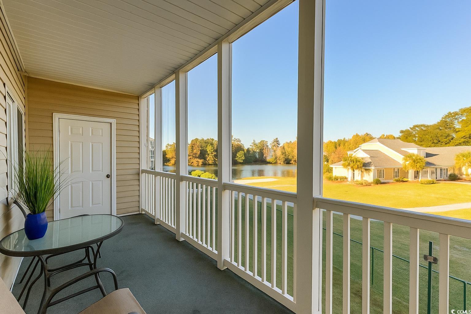 1100 Commons Boulevard, Unit 508 Myrtle Beach, SC 29572 - Photo 3 of 24 Screened Porch with water views of the Pond and Intracoastal Waterway.