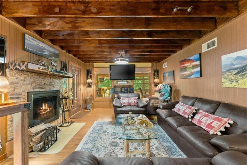 459 Gold Ridge Road Dahlonega, GA 30533 - Photo 11 of 47 a living room with furniture and a fireplace