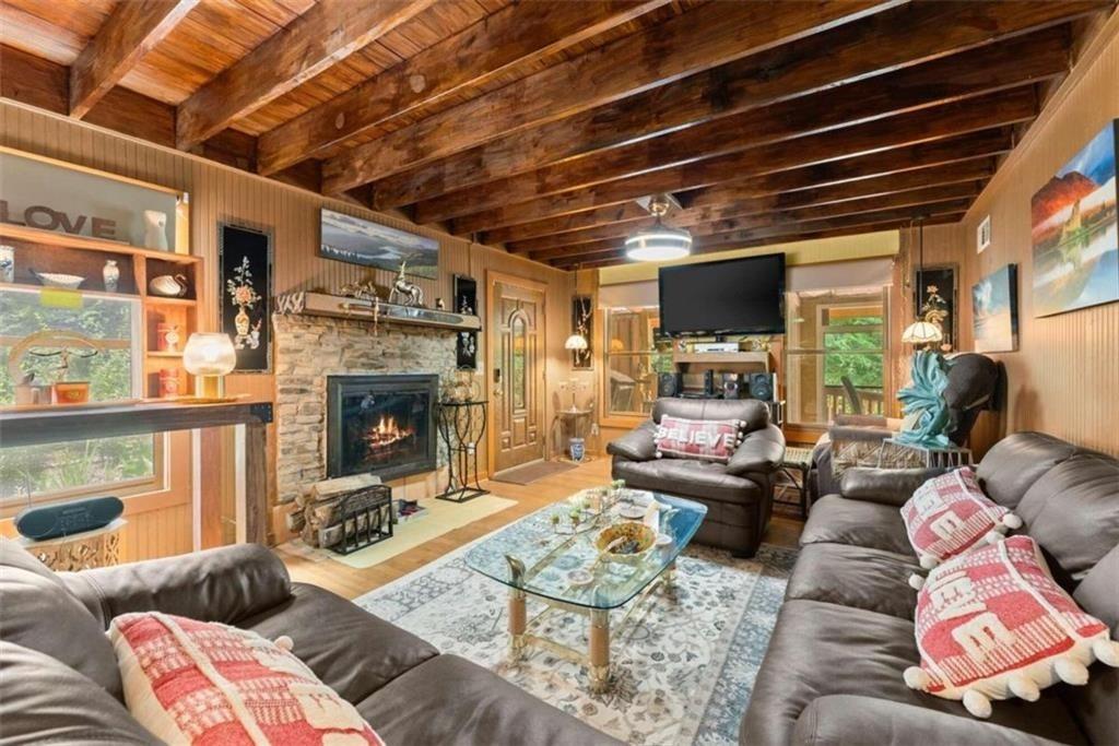 459 Gold Ridge Road Dahlonega, GA 30533 - Photo 12 of 47 a living room with furniture and a fireplace