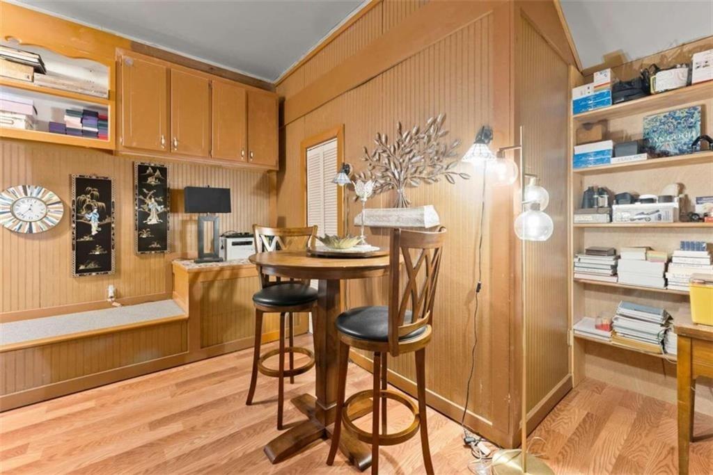 459 Gold Ridge Road Dahlonega, GA 30533 - Photo 17 of 47 a view of a dining room with furniture and wooden floor