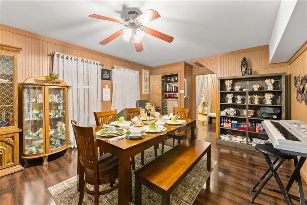 459 Gold Ridge Road Dahlonega, GA 30533 - Photo 19 of 47 a view of a dining room with furniture window and wooden floor