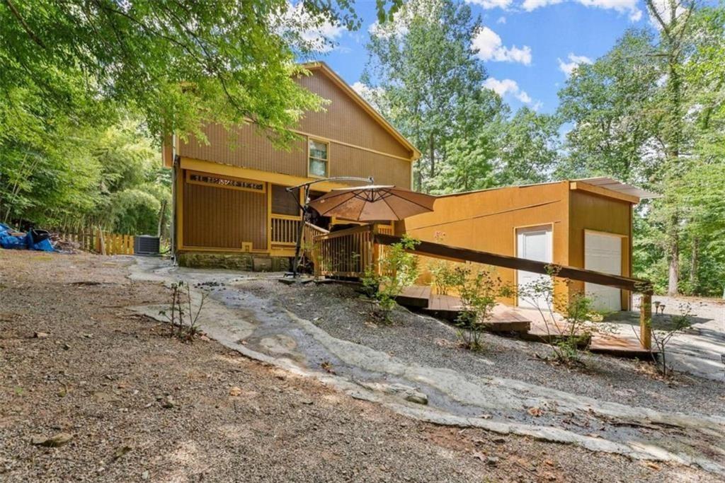 459 Gold Ridge Road Dahlonega, GA 30533 - Photo 2 of 47 a view of a house with a yard