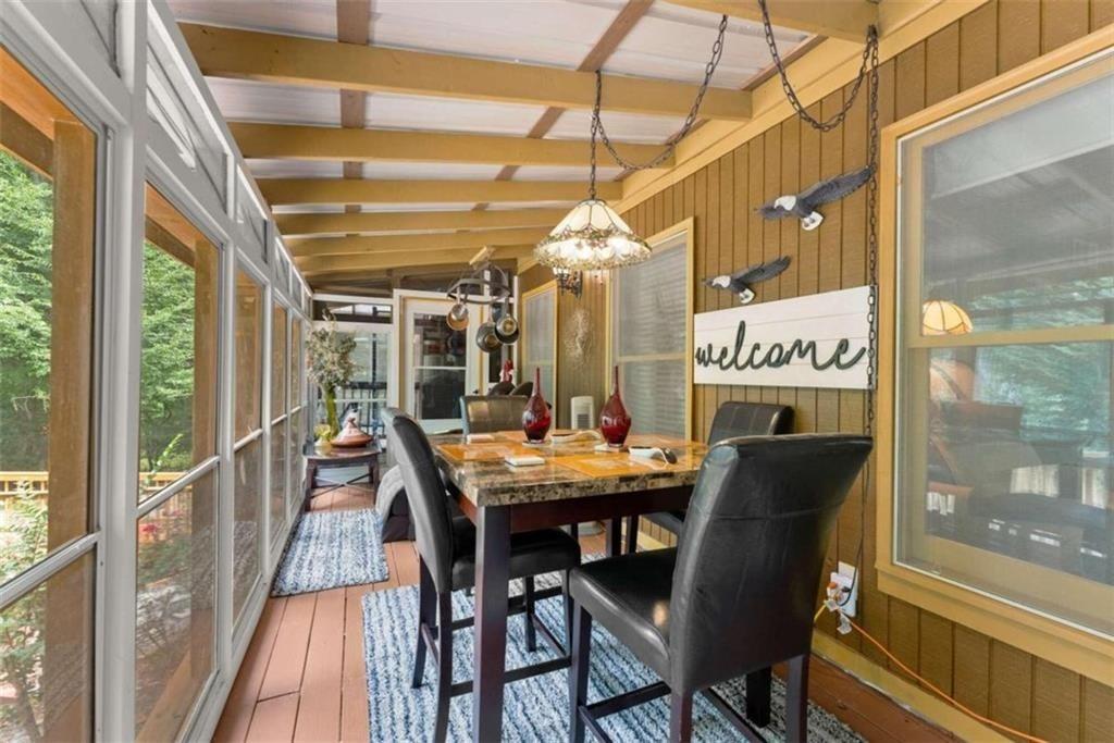 459 Gold Ridge Road Dahlonega, GA 30533 - Photo 21 of 47 a dining room with a table and chairs