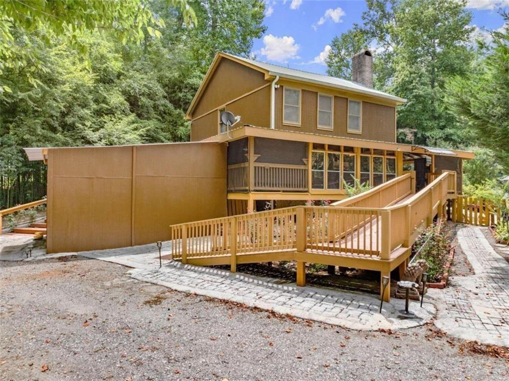 459 Gold Ridge Road Dahlonega, GA 30533 - Photo 3 of 47 a front view of a house with a yard