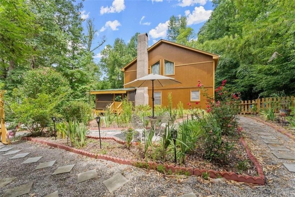 459 Gold Ridge Road Dahlonega, GA 30533 - Photo 38 of 47 a view of a house with a yard