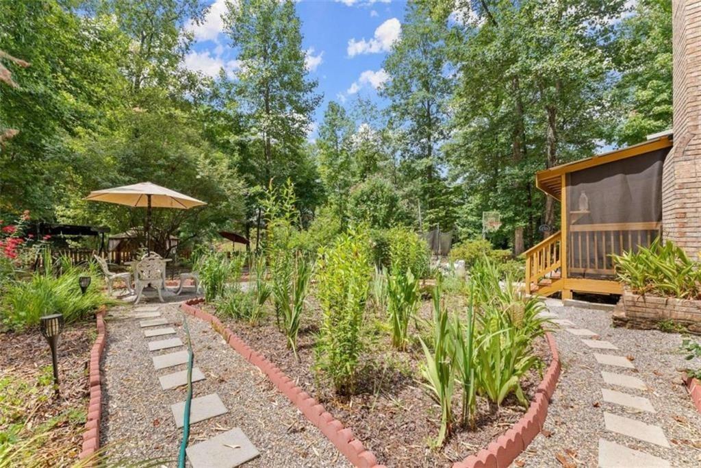 459 Gold Ridge Road Dahlonega, GA 30533 - Photo 40 of 47 a garden view with a seating space