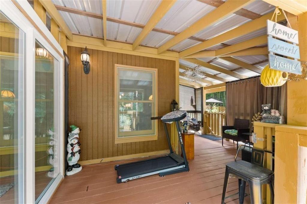 459 Gold Ridge Road Dahlonega, GA 30533 - Photo 8 of 47 a front view of a house with outdoor seating