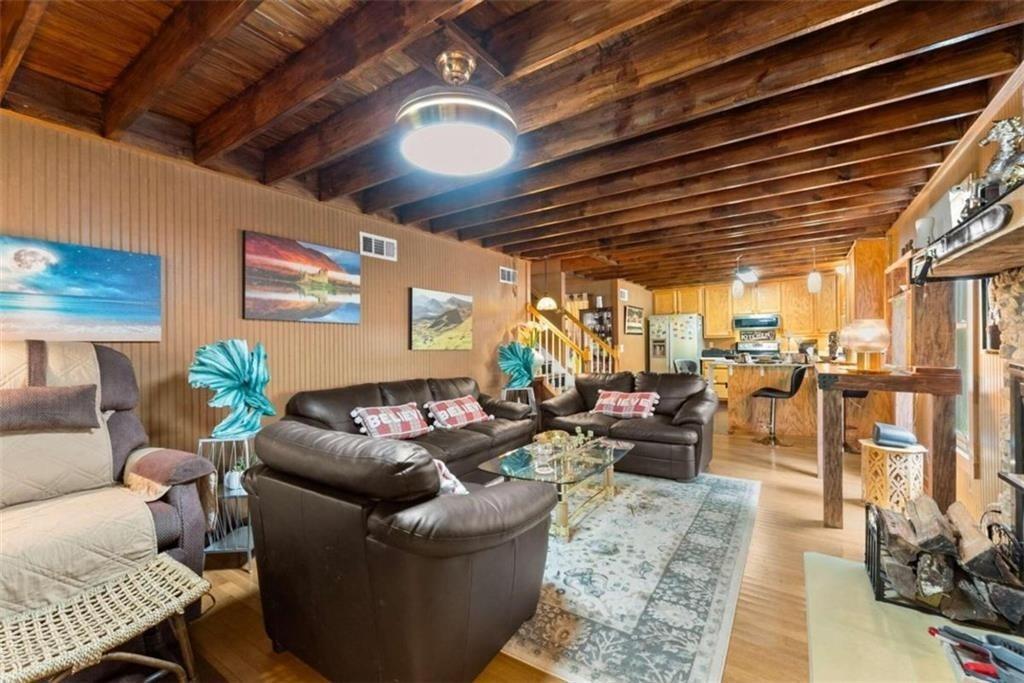 459 Gold Ridge Road Dahlonega, GA 30533 - Photo 9 of 47 a living room with furniture and a ceiling fan