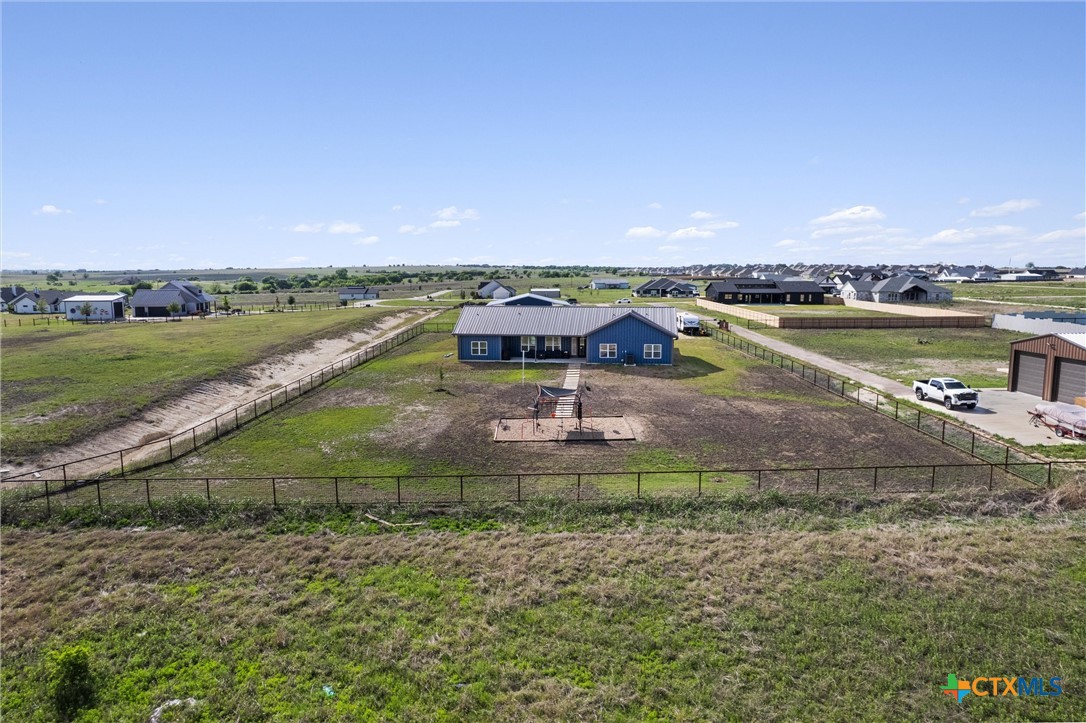 15073 Armstrong Ests Road Salado, TX 76571 - Photo 40 of 44 an aerial view of a house with a yard and lake view