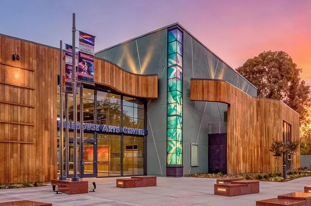 a view of a brick house with a large windows