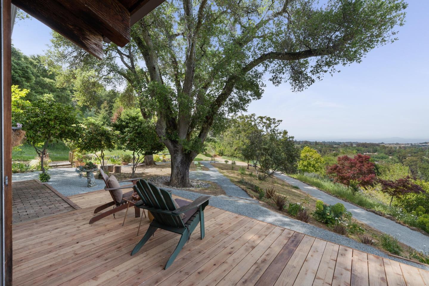 22 Preston Road Woodside, CA 94062 - Photo 11 of 60 a view of a backyard with sitting area