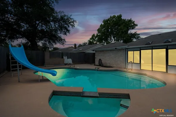 swimming pool with a outdoor seating
