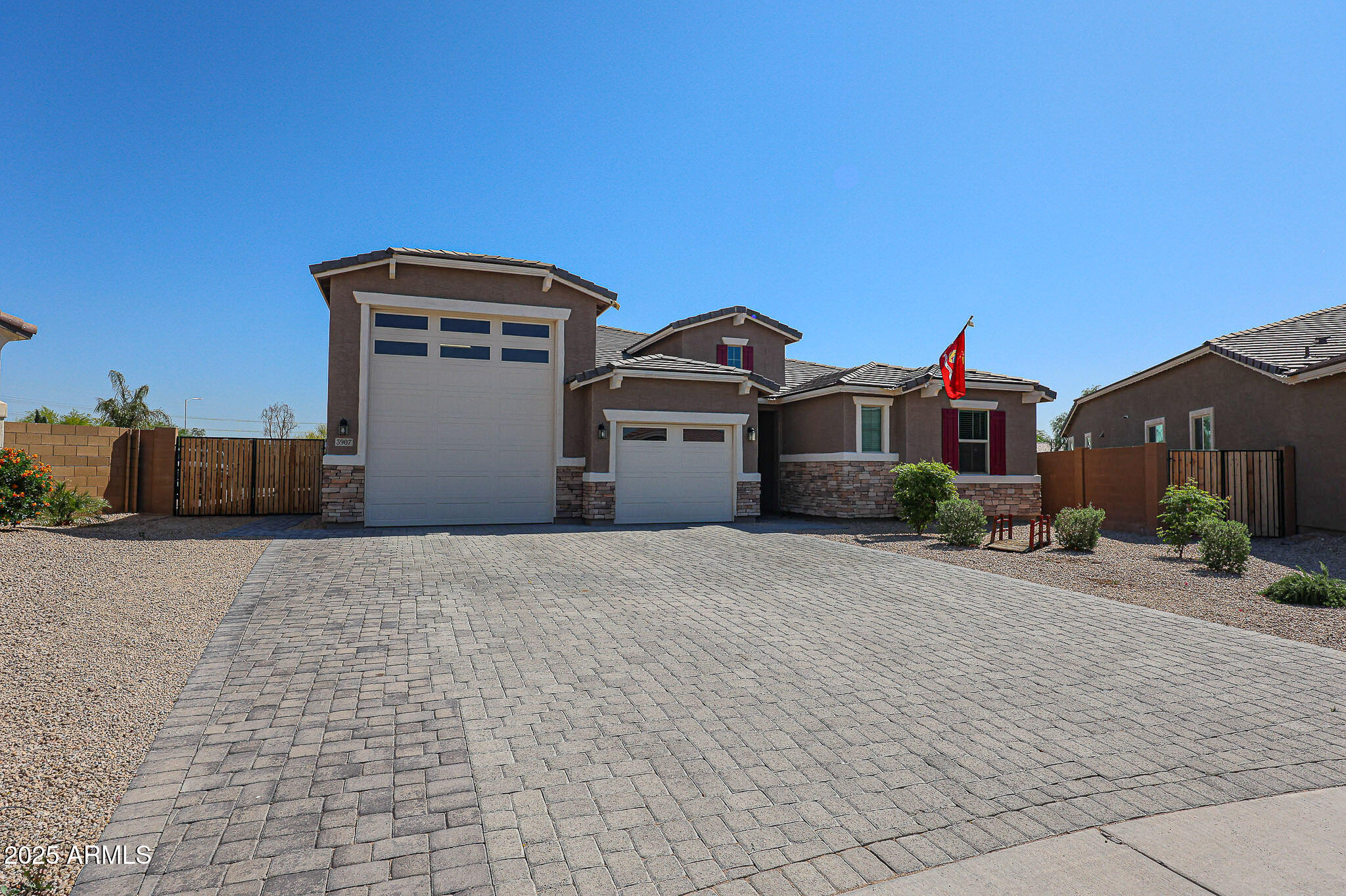 3907 South 75th Drive Phoenix, AZ 85043 - Photo 10 of 49 a front view of a house with a yard