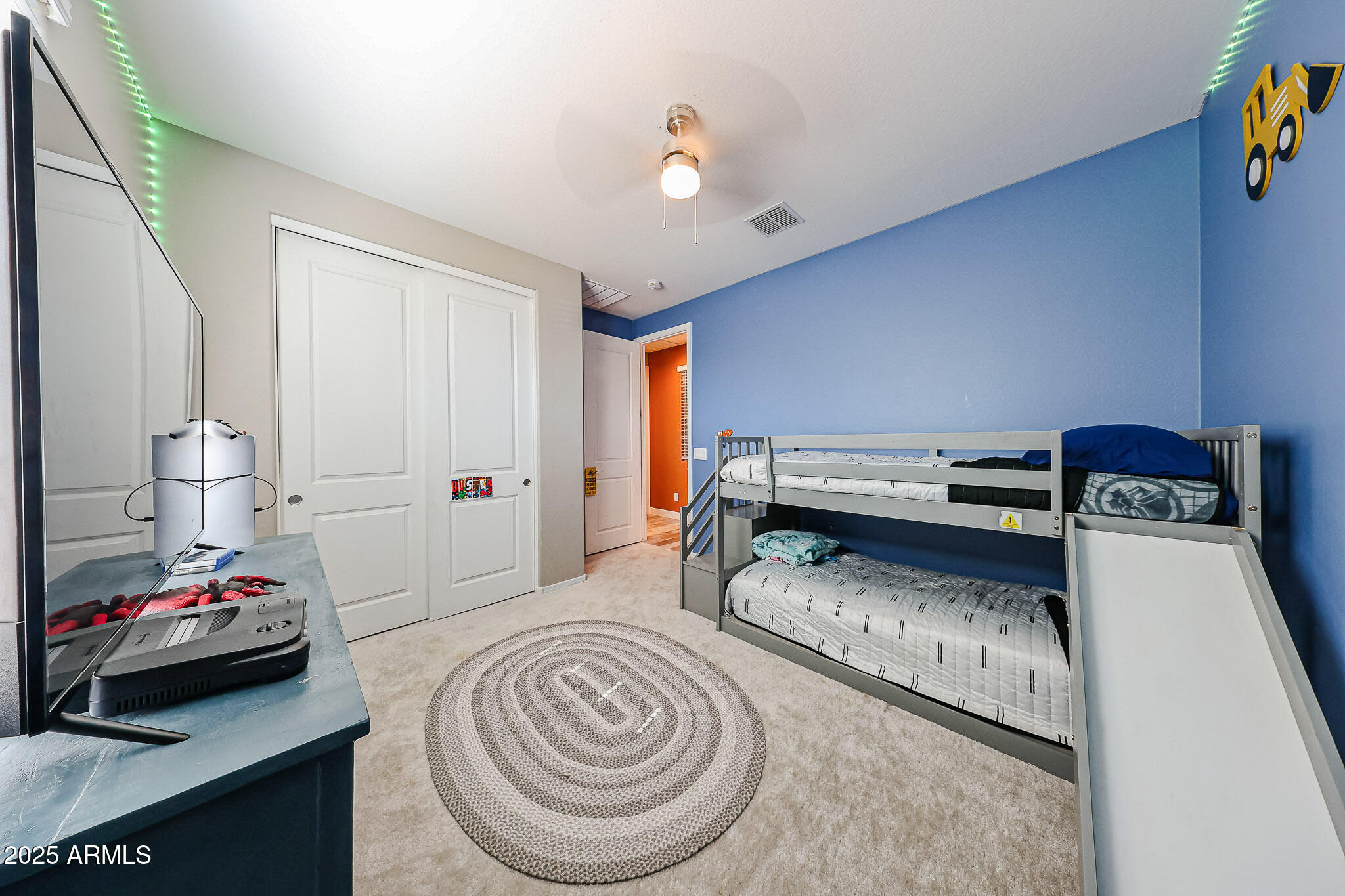 3907 South 75th Drive Phoenix, AZ 85043 - Photo 19 of 49 a bedroom with a bed and a window