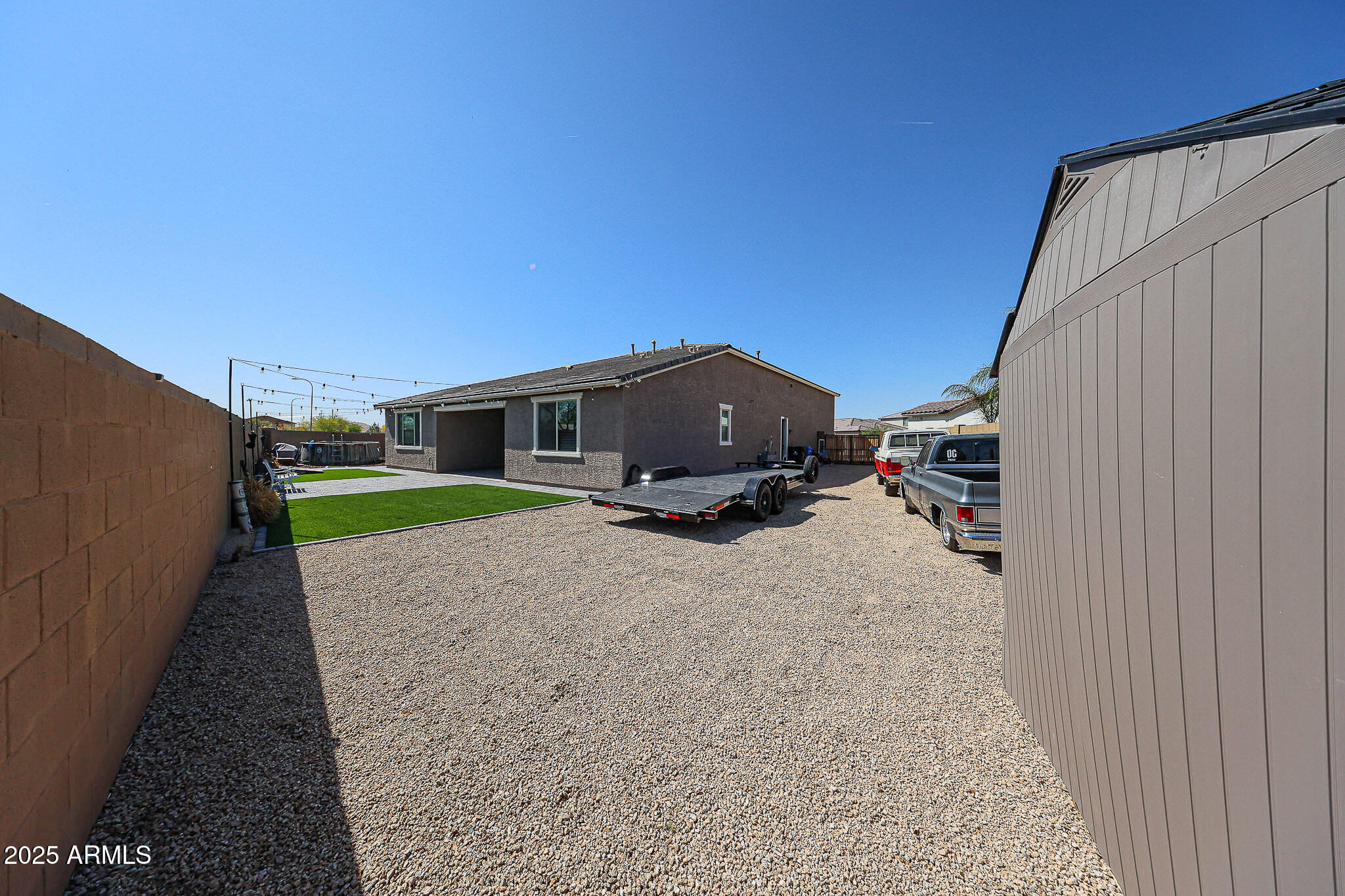 3907 South 75th Drive Phoenix, AZ 85043 - Photo 41 of 49 a house view with a garden space