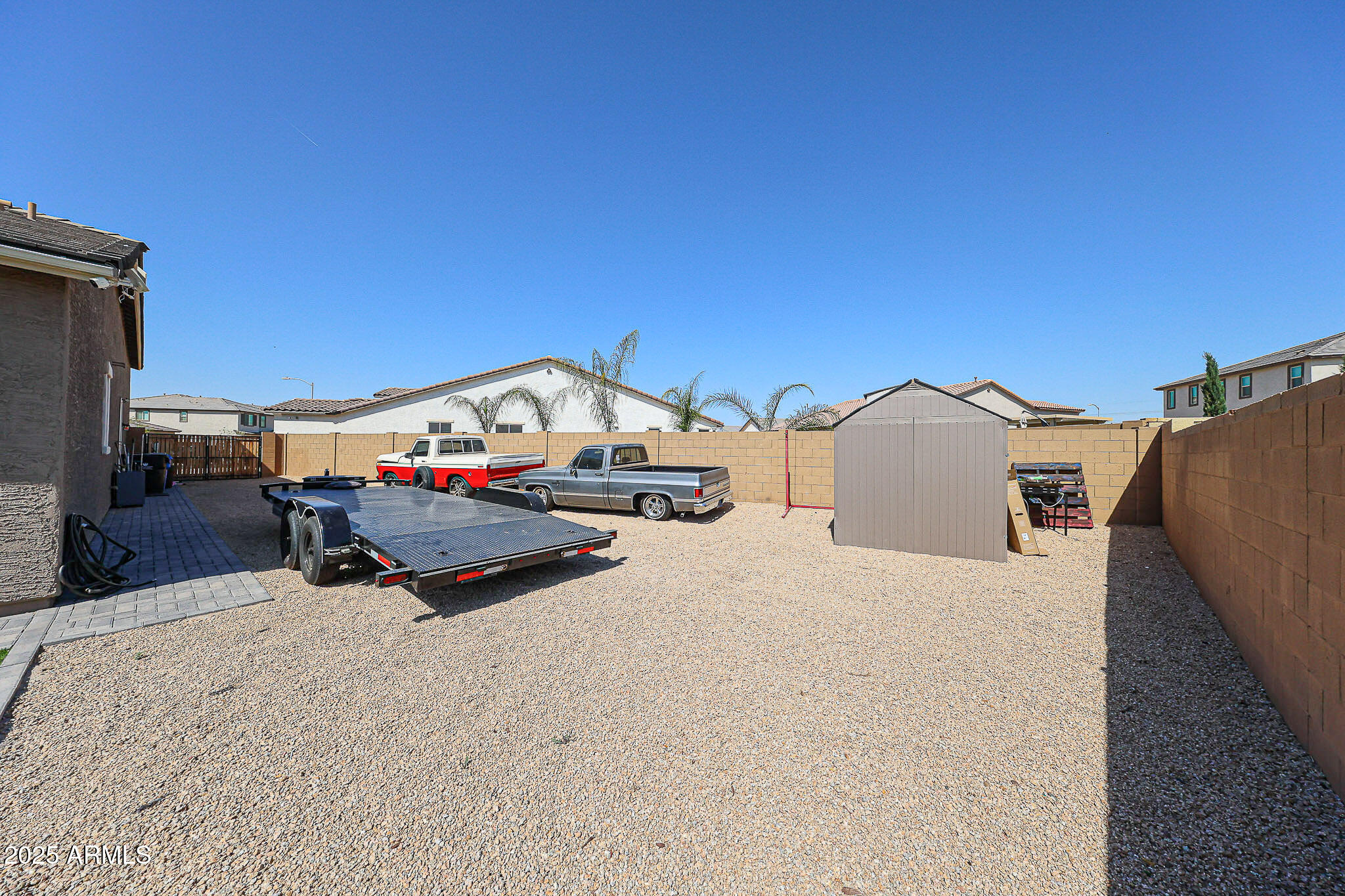 3907 South 75th Drive Phoenix, AZ 85043 - Photo 42 of 49 a yellow house with trees in front of it