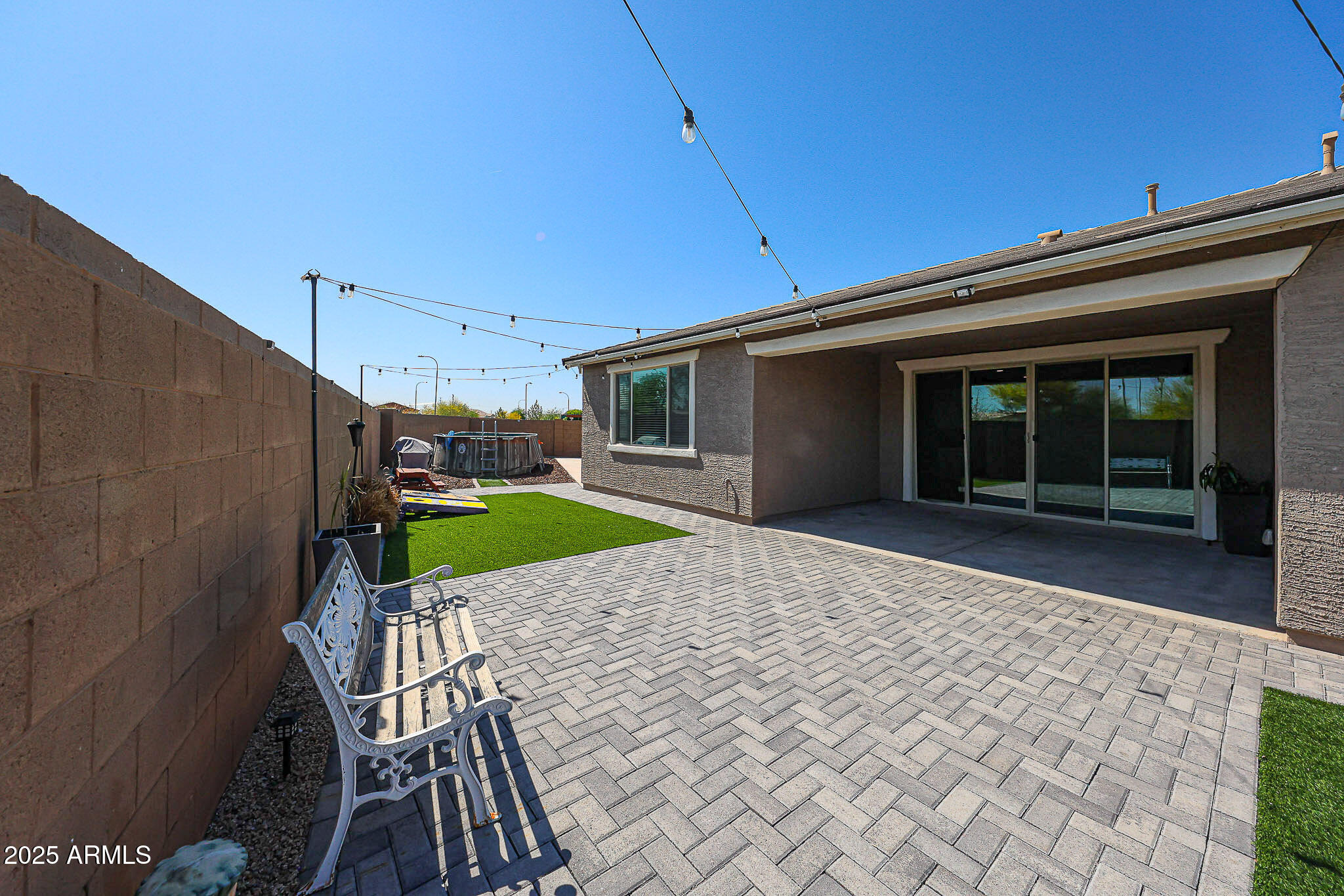3907 South 75th Drive Phoenix, AZ 85043 - Photo 44 of 49 a view of a house with a backyard