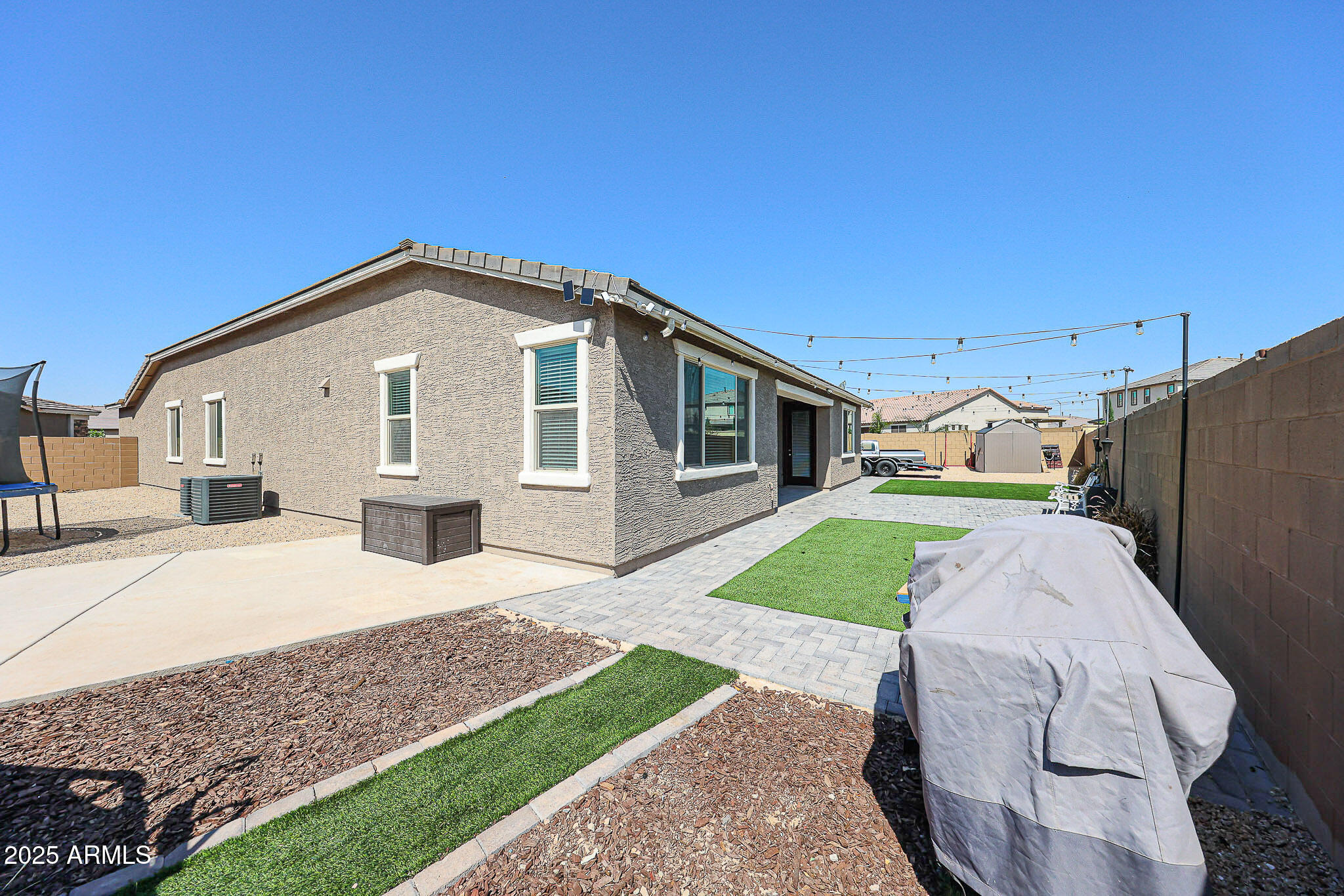 3907 South 75th Drive Phoenix, AZ 85043 - Photo 46 of 49 a front view of a house with a yard