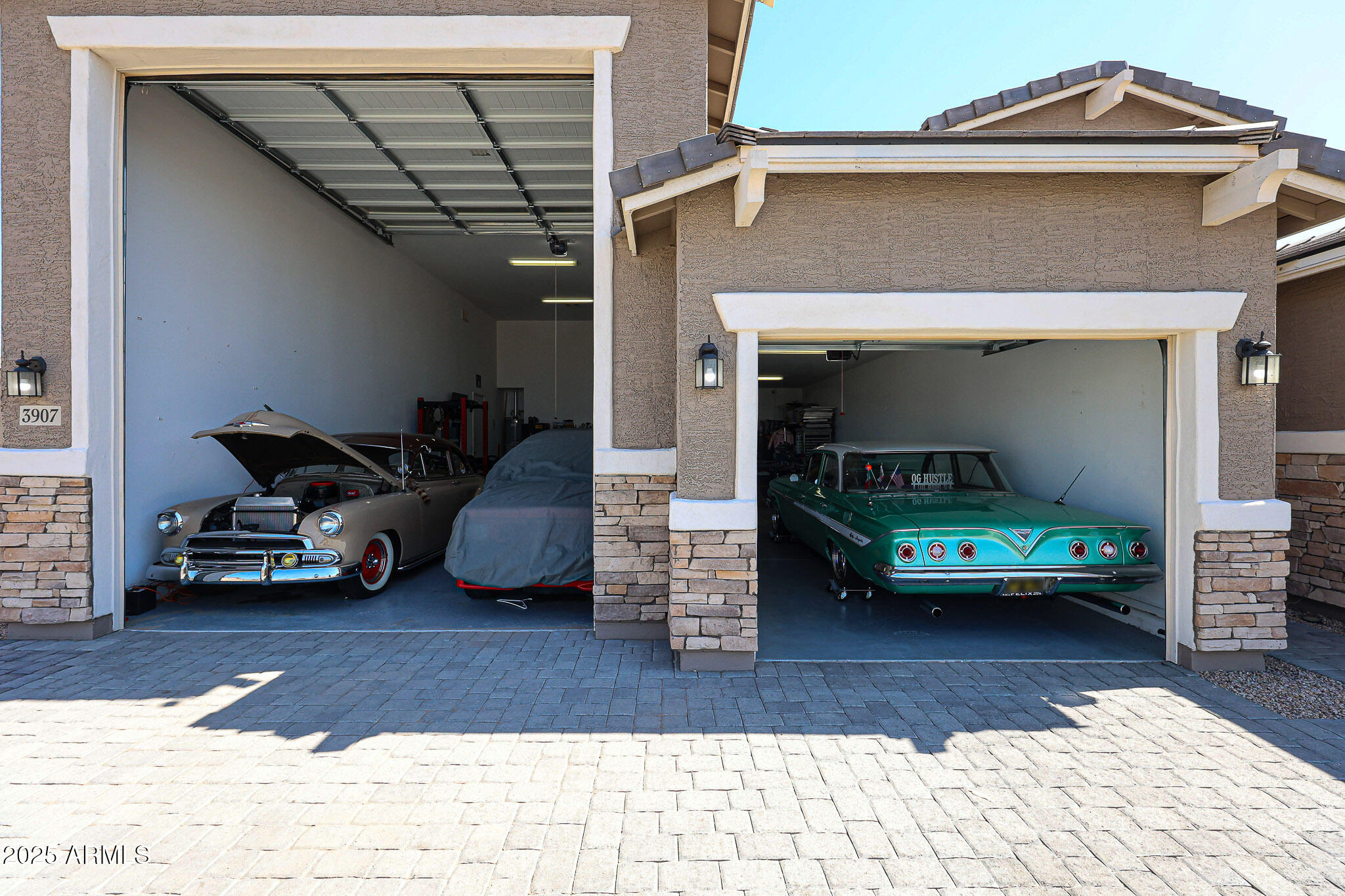 3907 South 75th Drive Phoenix, AZ 85043 - Photo 48 of 49 a car parked in front of a house