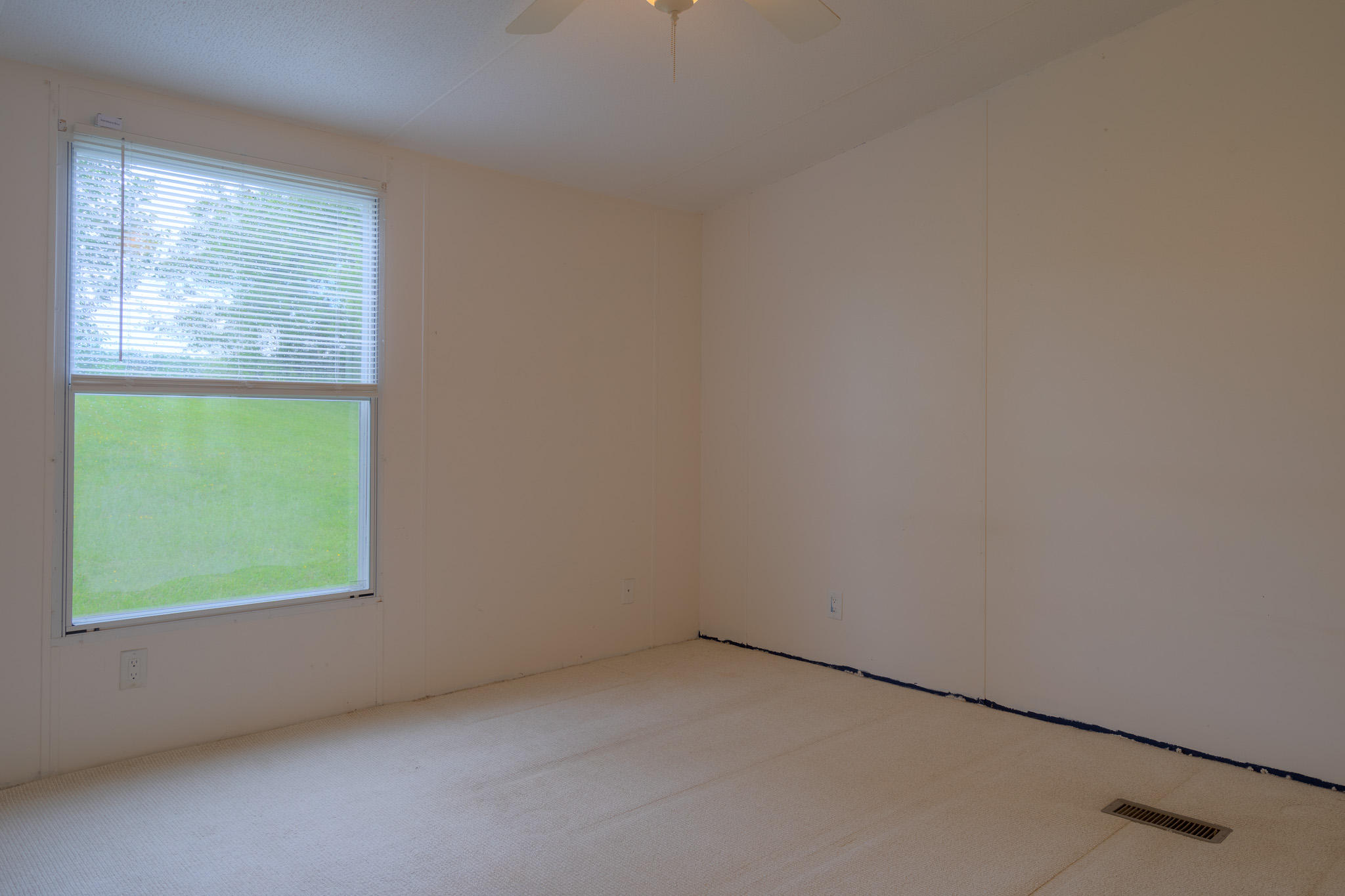 3240 Dallas Freeman Road Hiwassee, VA 24347 - Photo 11 of 42 an empty room with a window
