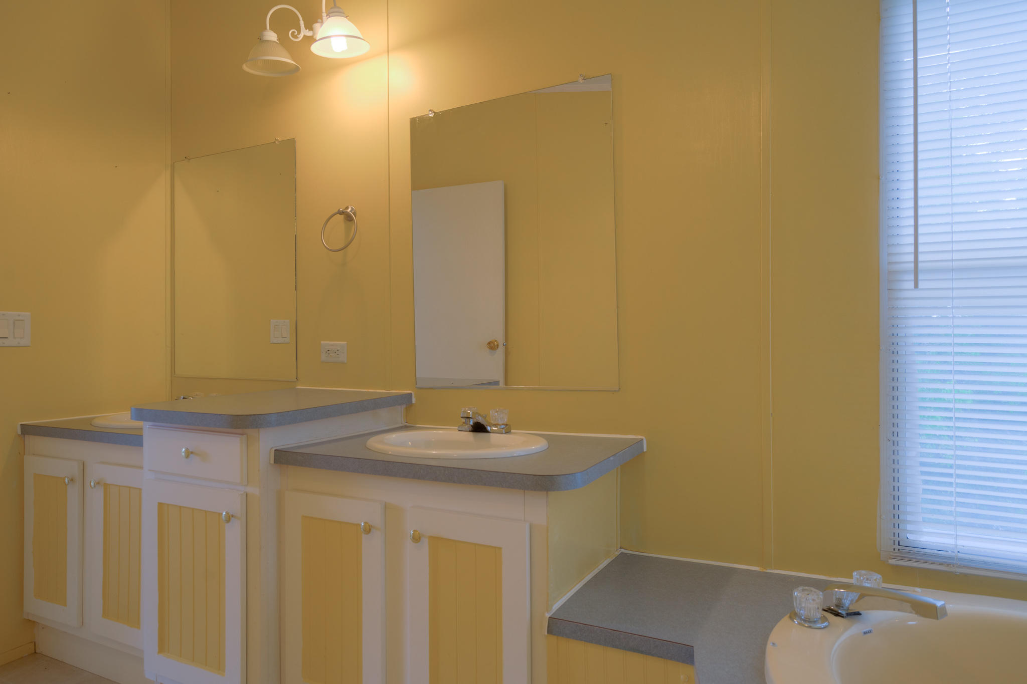 3240 Dallas Freeman Road Hiwassee, VA 24347 - Photo 15 of 42 a bathroom with a sink and a mirror