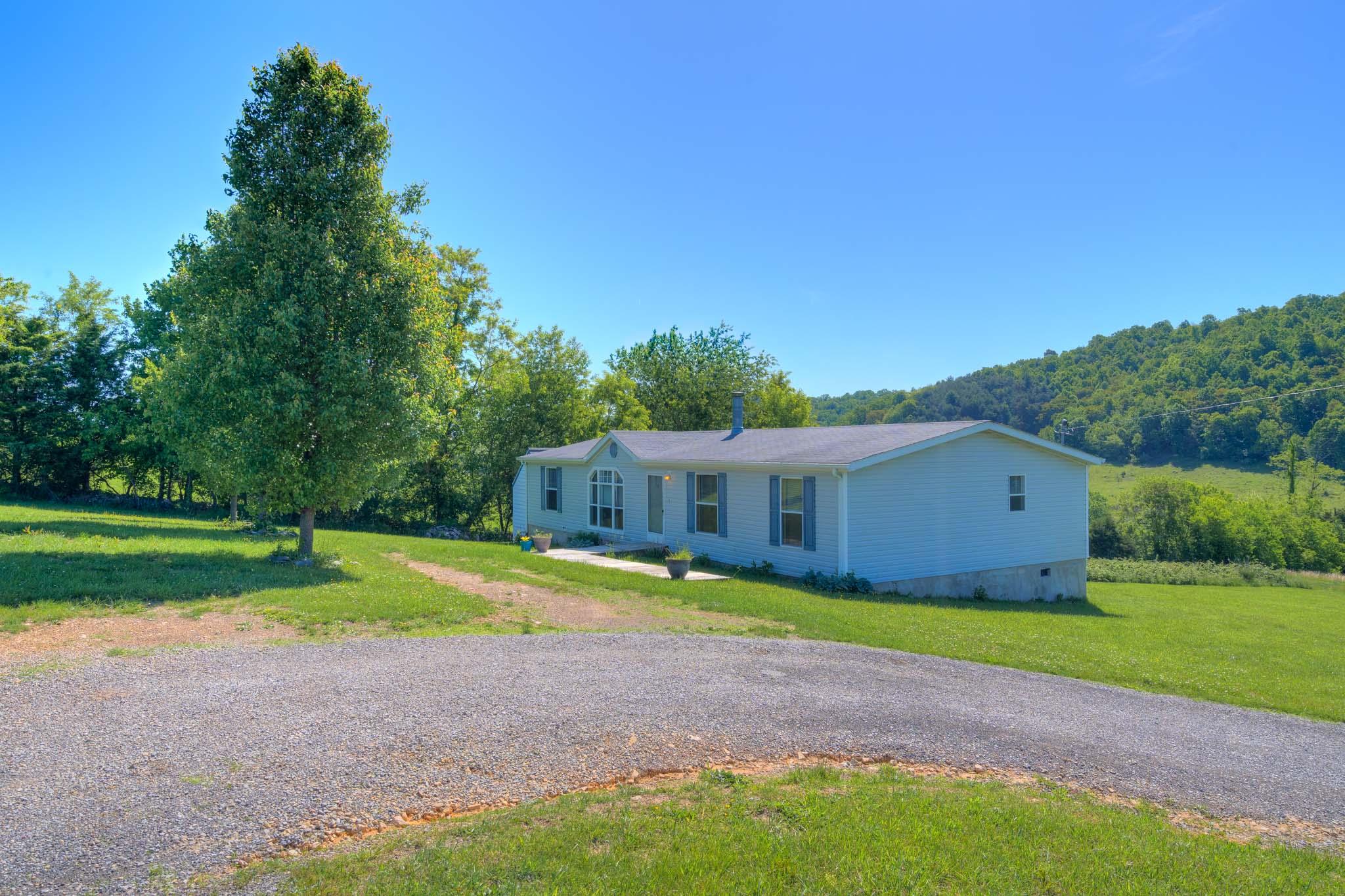 3240 Dallas Freeman Road Hiwassee, VA 24347 - Photo 23 of 42 a view of an house with swimming pool and yard