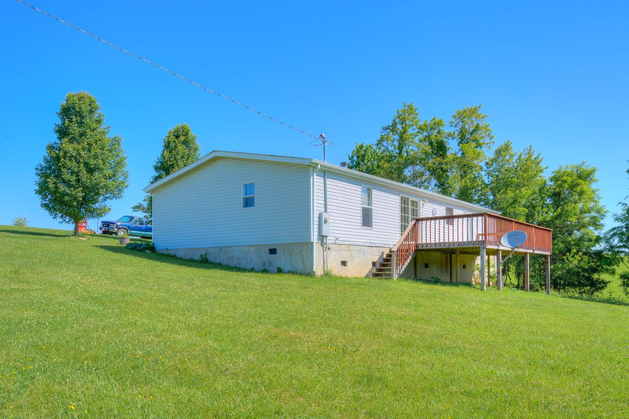 3240 Dallas Freeman Road Hiwassee, VA 24347 - Photo 29 of 42 a view of a house with backyard and garden