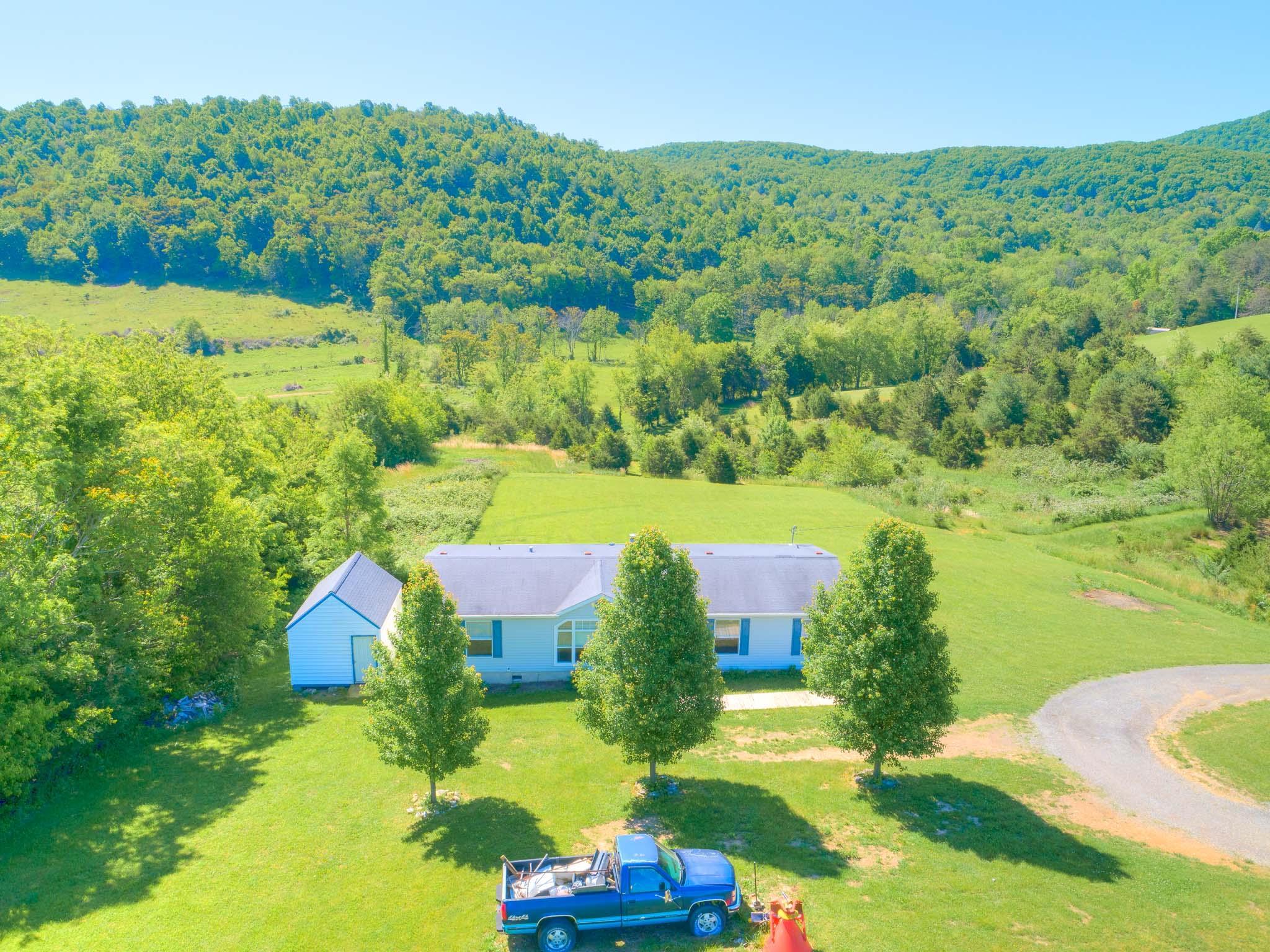 3240 Dallas Freeman Road Hiwassee, VA 24347 - Photo 33 of 42 an aerial view of a house with yard swimming pool and outdoor seating