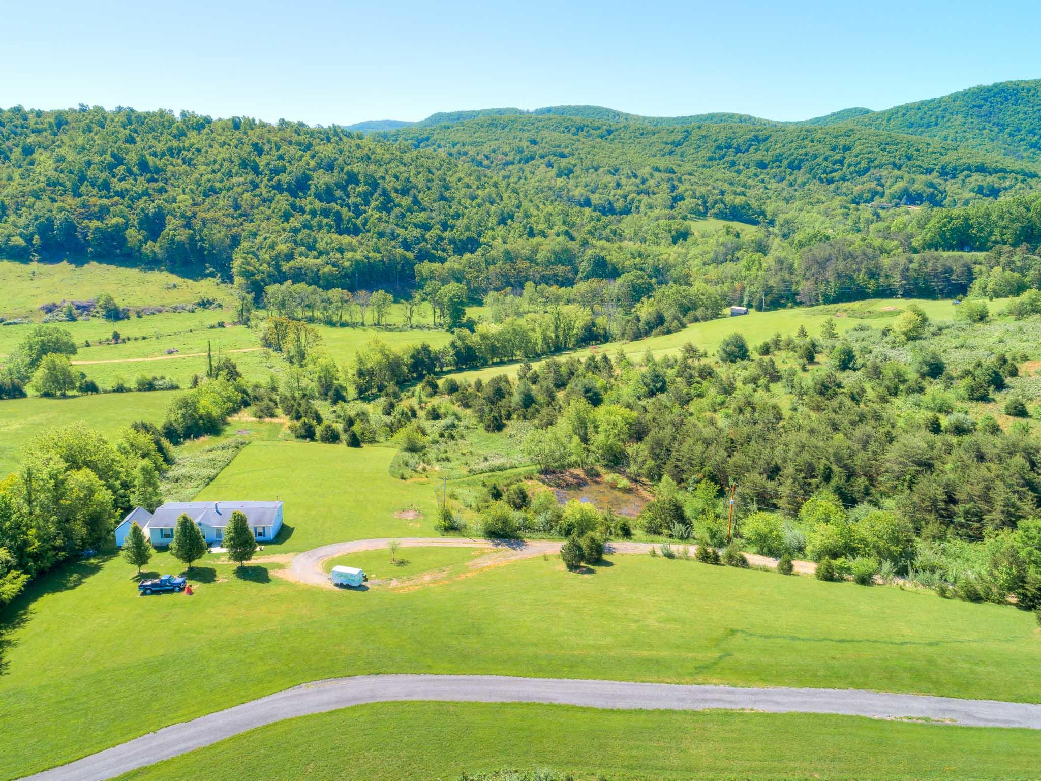 3240 Dallas Freeman Road Hiwassee, VA 24347 - Photo 35 of 42 a view of a lush green field
