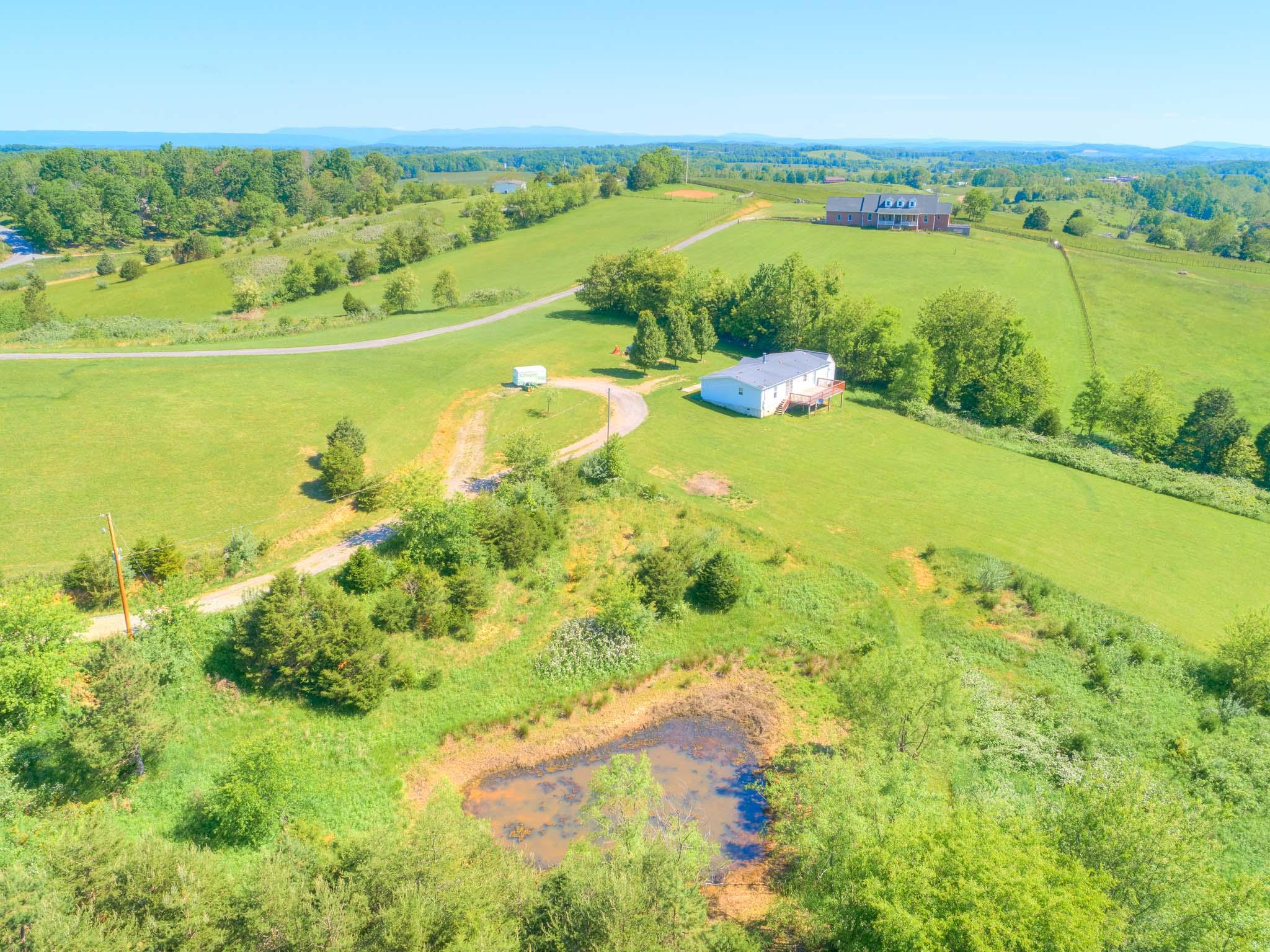 3240 Dallas Freeman Road Hiwassee, VA 24347 - Photo 42 of 42 a view of a lake with a mountain