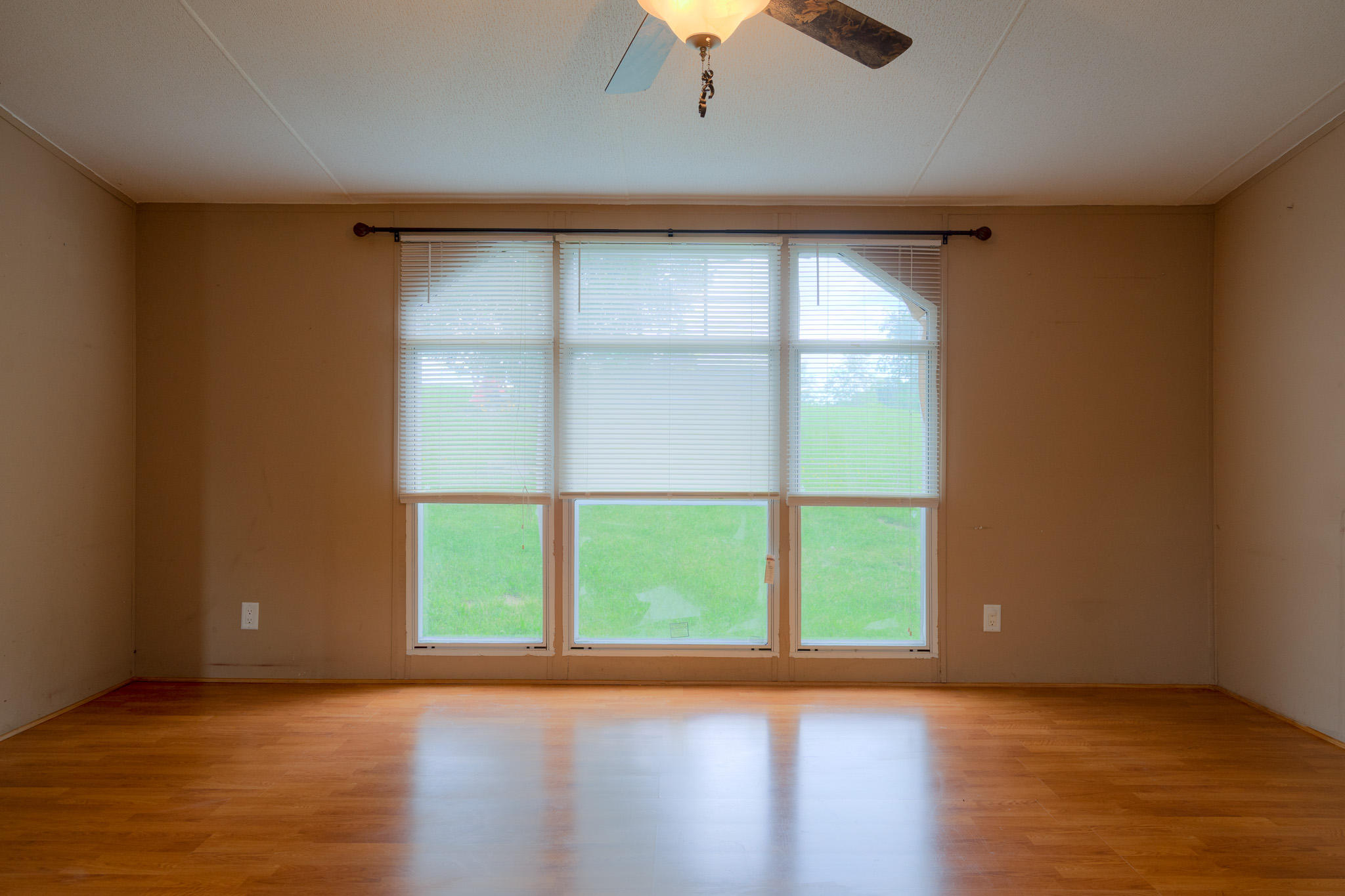 3240 Dallas Freeman Road Hiwassee, VA 24347 - Photo 6 of 42 a view of room with window and wooden floor