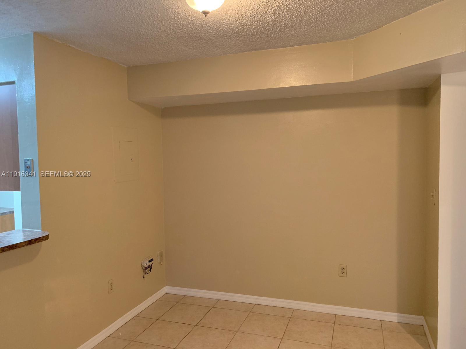 15221 Southwest 80th Street, Unit 404 Miami, FL 33193 - Photo 4 of 6 a view of an empty room