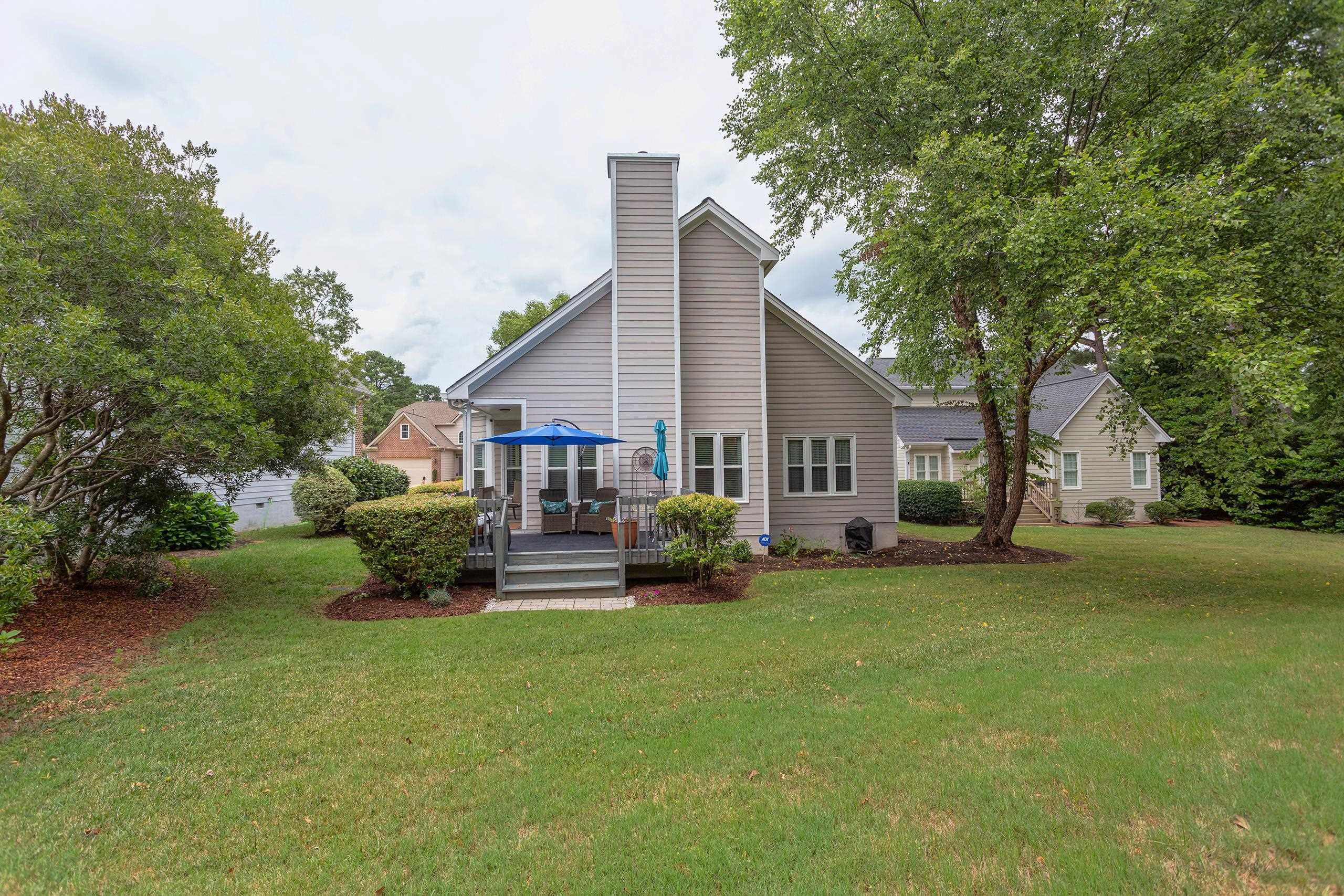 2913 Hawtree Drive Raleigh, NC 27613 - Photo 28 of 28 Simply charming from front porch to back deck and in between. Exterior Back