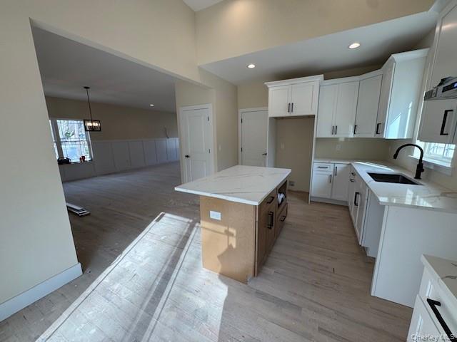 N/c Westfield Lot 2 Rd Coram, NY 11727 - Photo 7 of 24 a large kitchen with stainless steel appliances granite countertop a lot of counter space and wooden floor