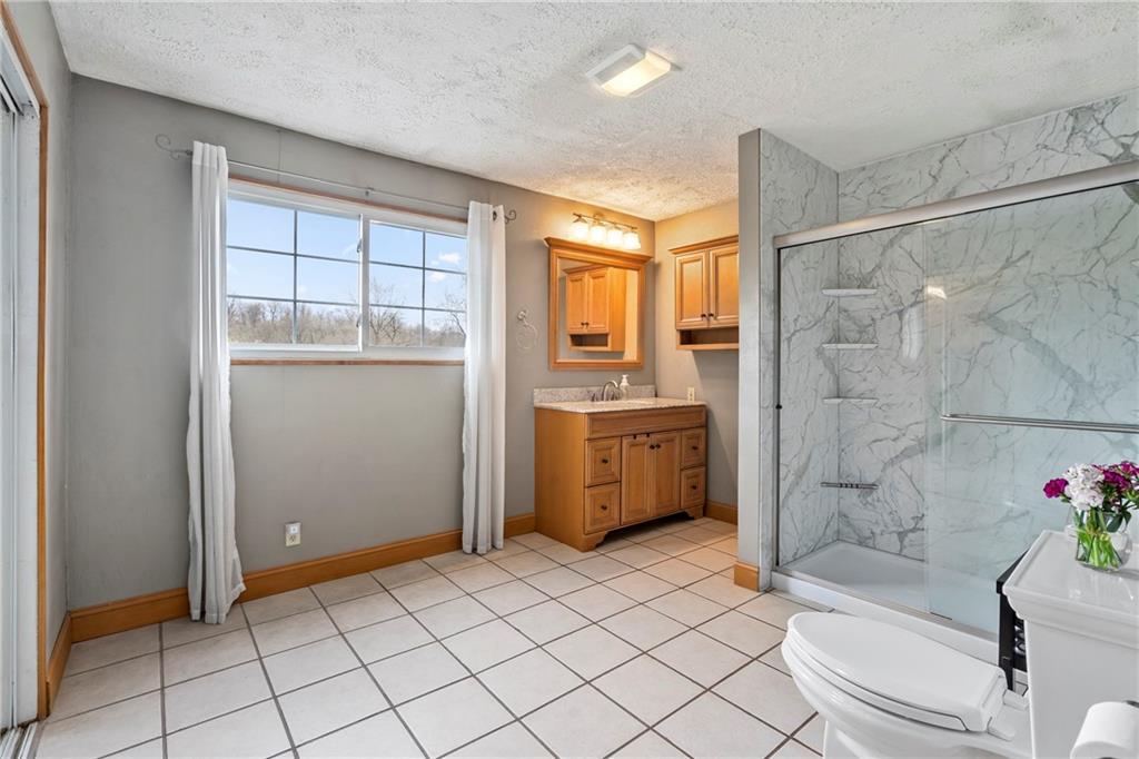 459 East Garden Road Pittsburgh, PA 15227 - Photo 20 of 35 a bathroom with a sink toilet and shower
