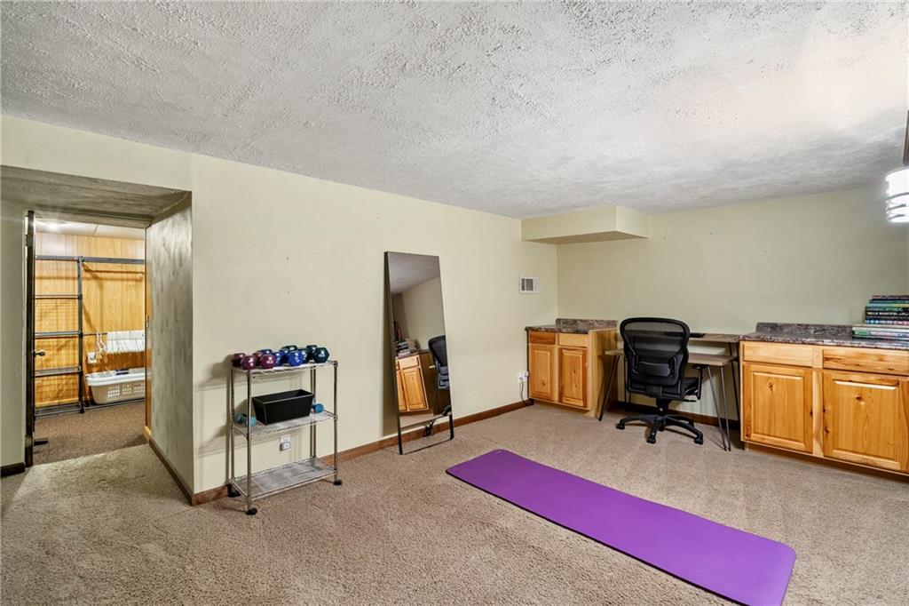 459 East Garden Road Pittsburgh, PA 15227 - Photo 24 of 35 a room with furniture and gym equipment