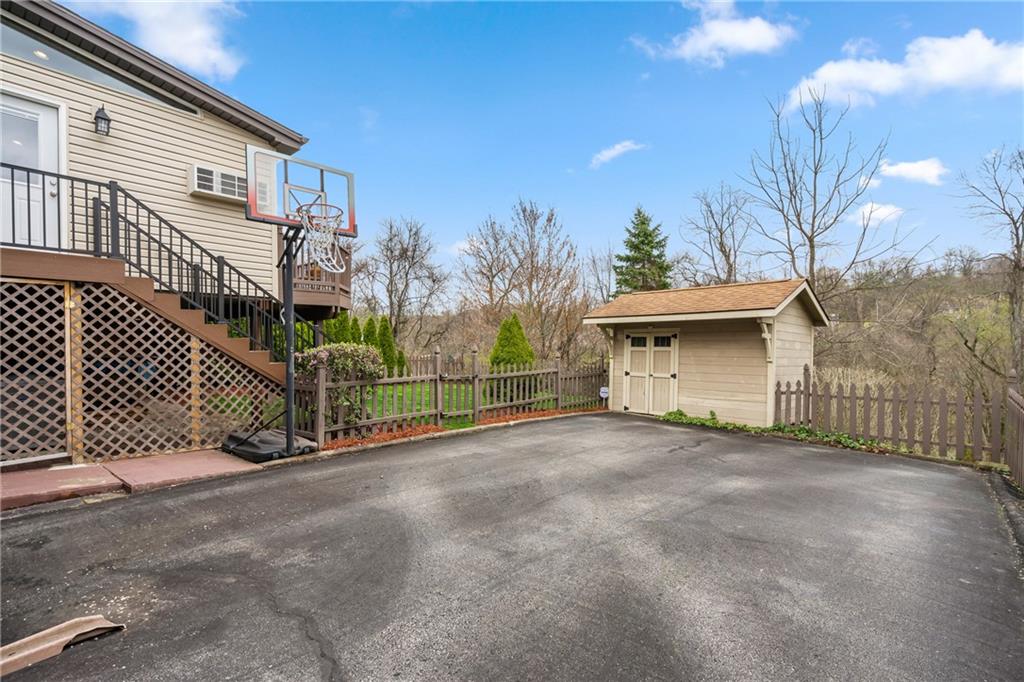 459 East Garden Road Pittsburgh, PA 15227 - Photo 29 of 35 a view of a house with a wooden fence