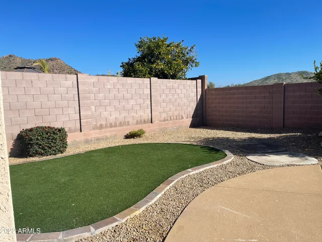 a view of backyard with outdoor space