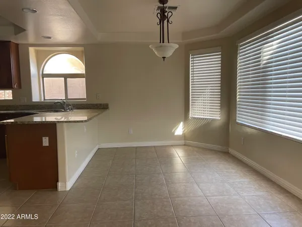 a view of a hallway with stairs