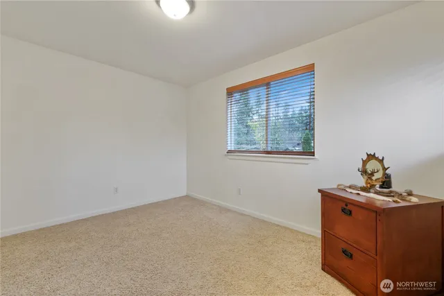 a room with furniture and window