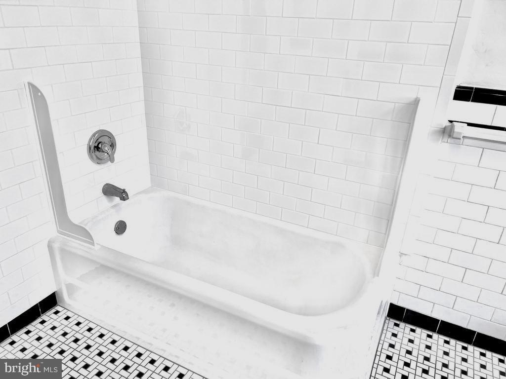 111 Chestnut Avenue Narberth, PA 19072 - Photo 6 of 24 a bathroom with a bathtub and a shower