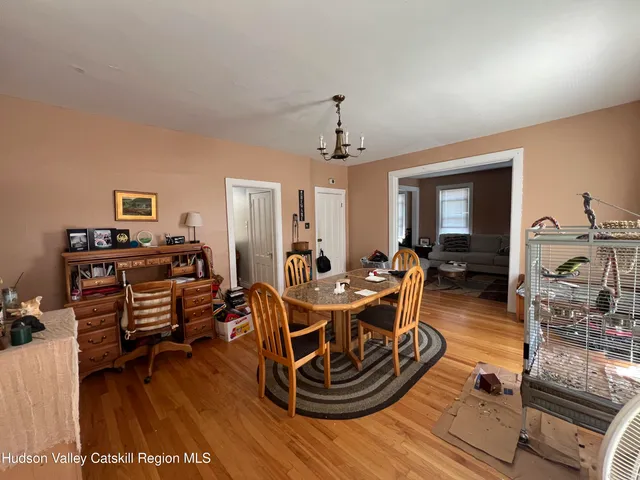 a room with lots of chairs and mirrors