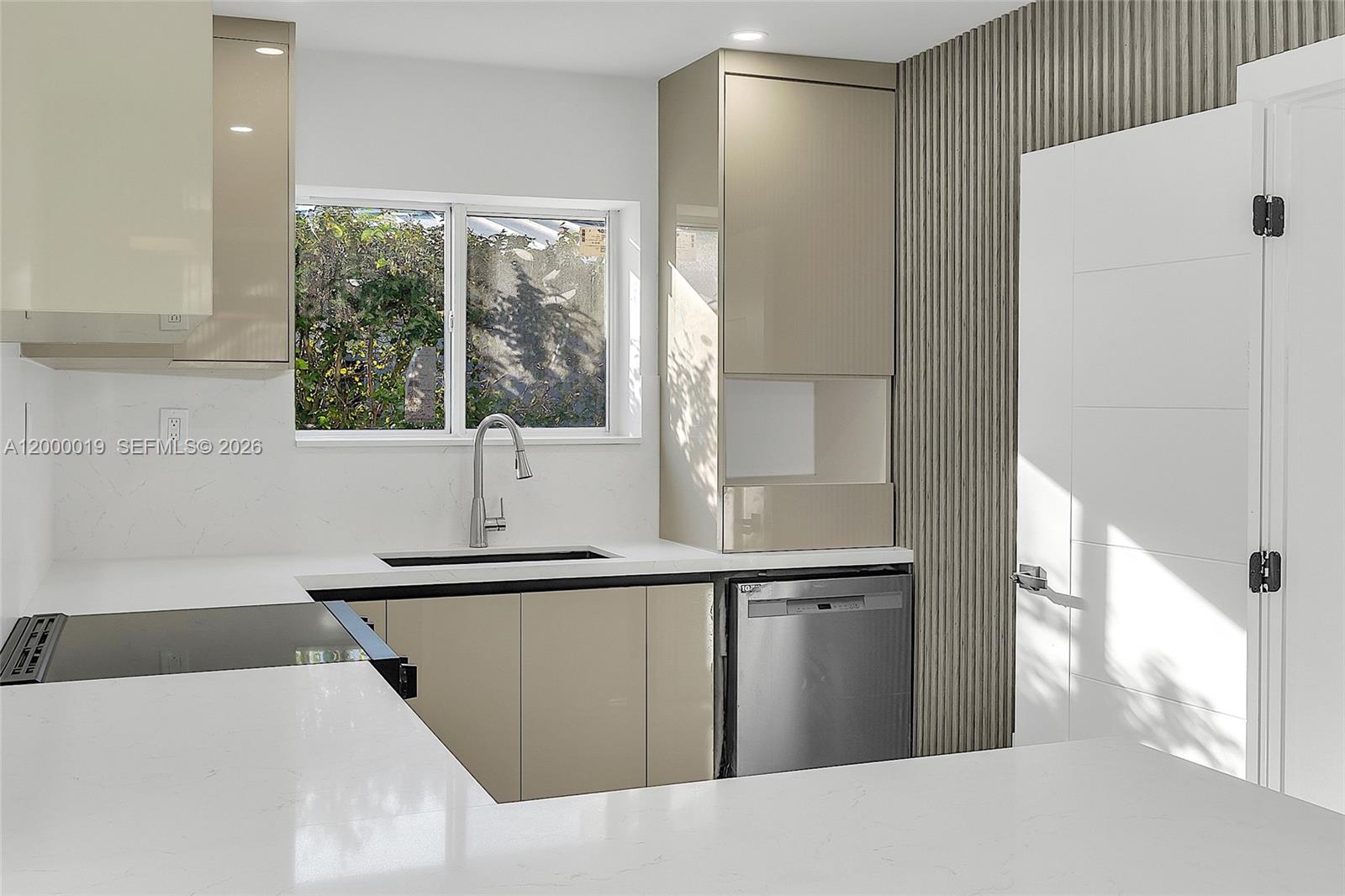6540 Southwest 25th Street Miami, FL 33155 - Photo 26 of 54 a kitchen with a sink and a window
