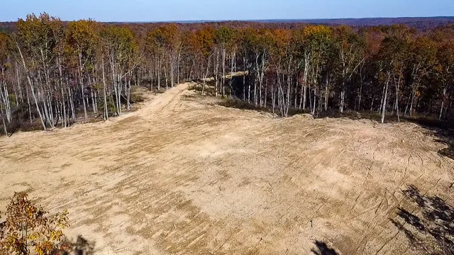a view of a backyard of the house