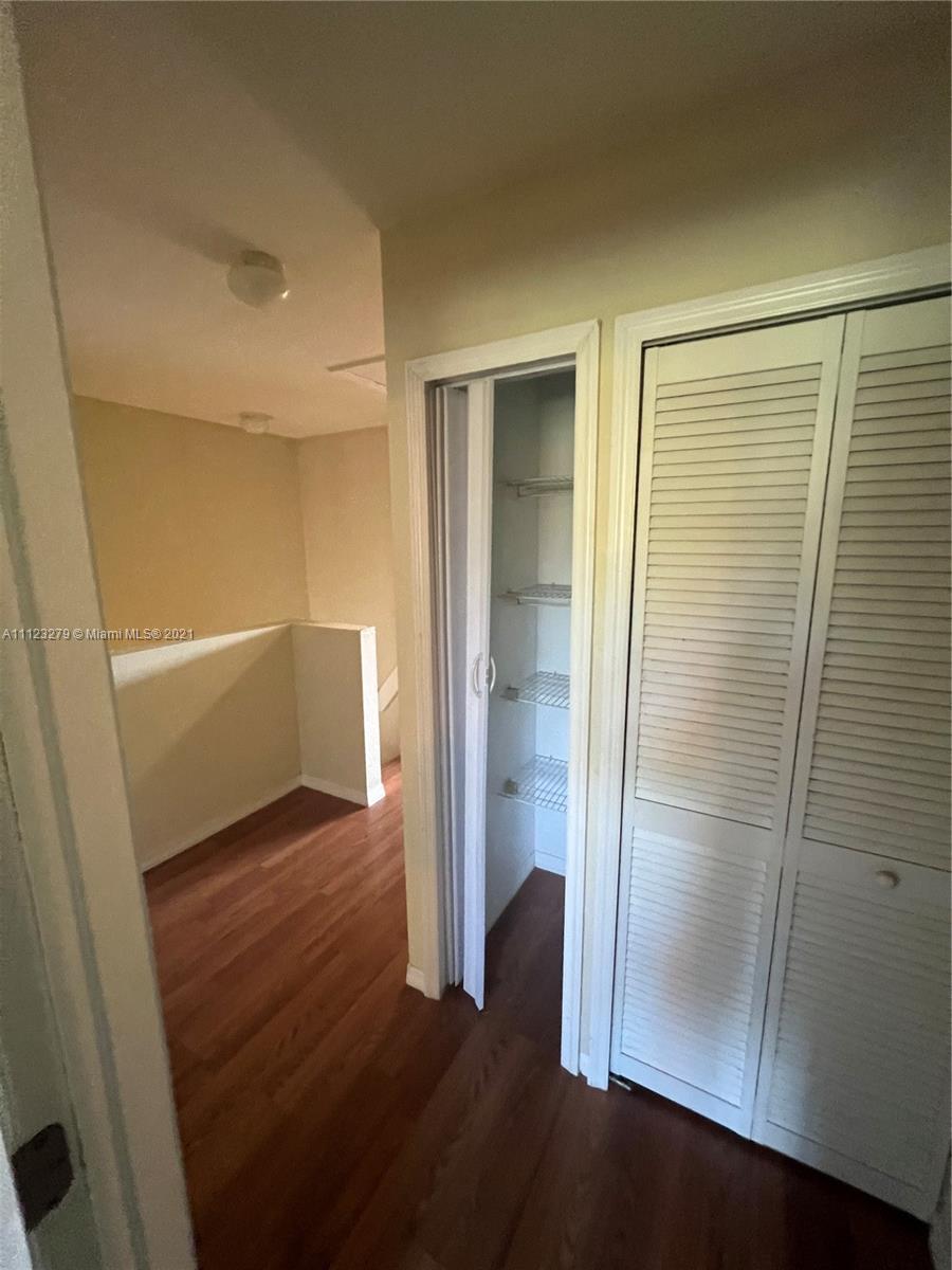 20441 Northwest 15th Avenue, Unit 8 Miami Gardens, FL 33169 - Photo 14 of 30 a view of empty room with wooden floor