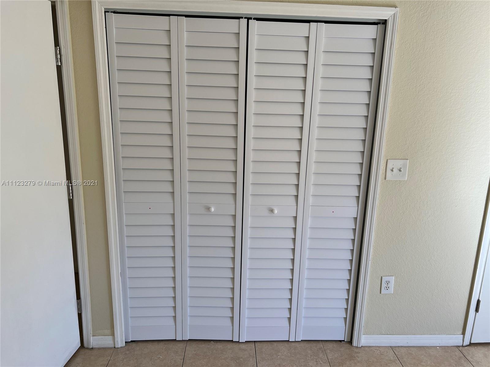 20441 Northwest 15th Avenue, Unit 8 Miami Gardens, FL 33169 - Photo 28 of 30 a view of closet area
