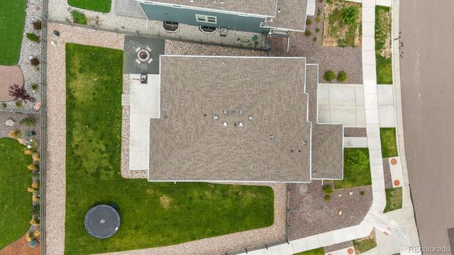 view of a house with a backyard