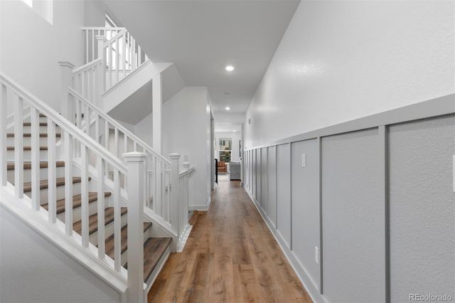 a view of entryway with wooden floor