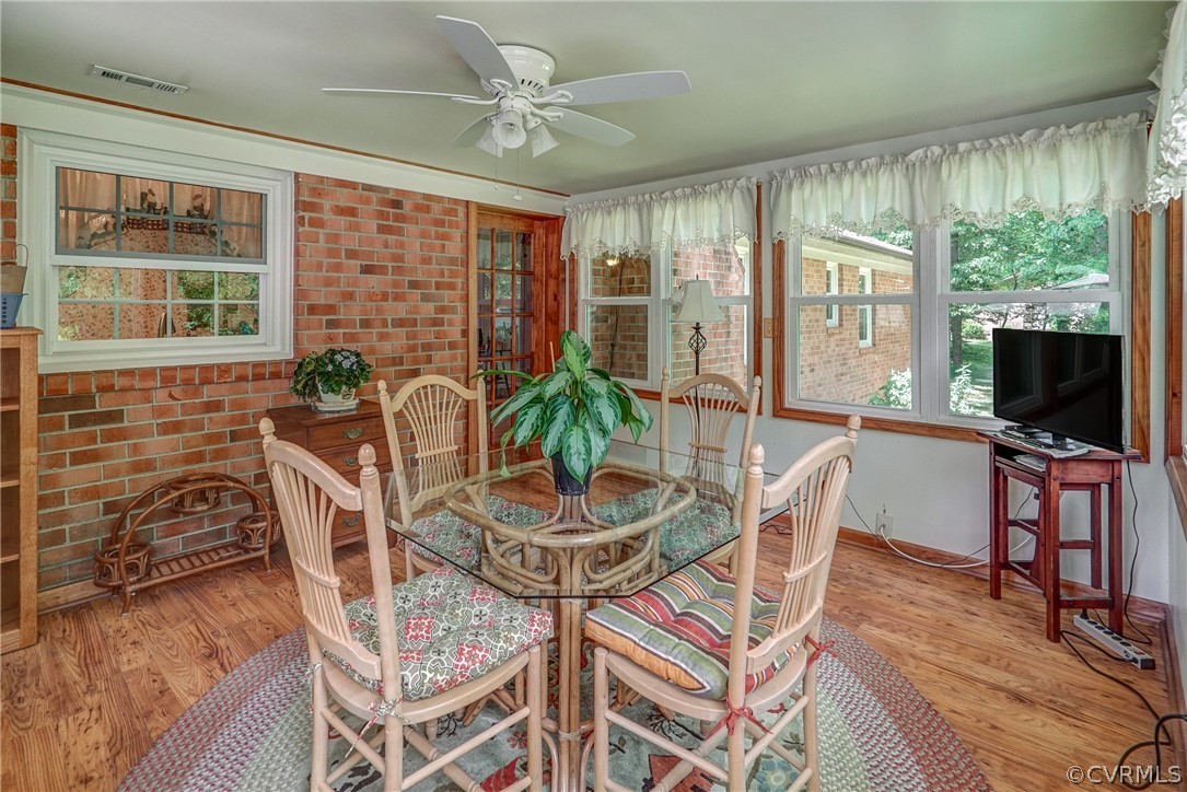 7651 Varann Road Henrico, VA 23231 - Photo 31 of 44 a view of a dining room with furniture window and outside view