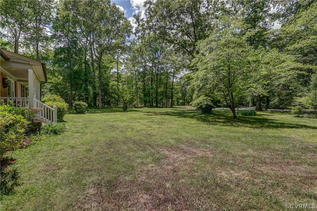 7651 Varann Road Henrico, VA 23231 - Photo 5 of 44 a view of outdoor space with trees all around